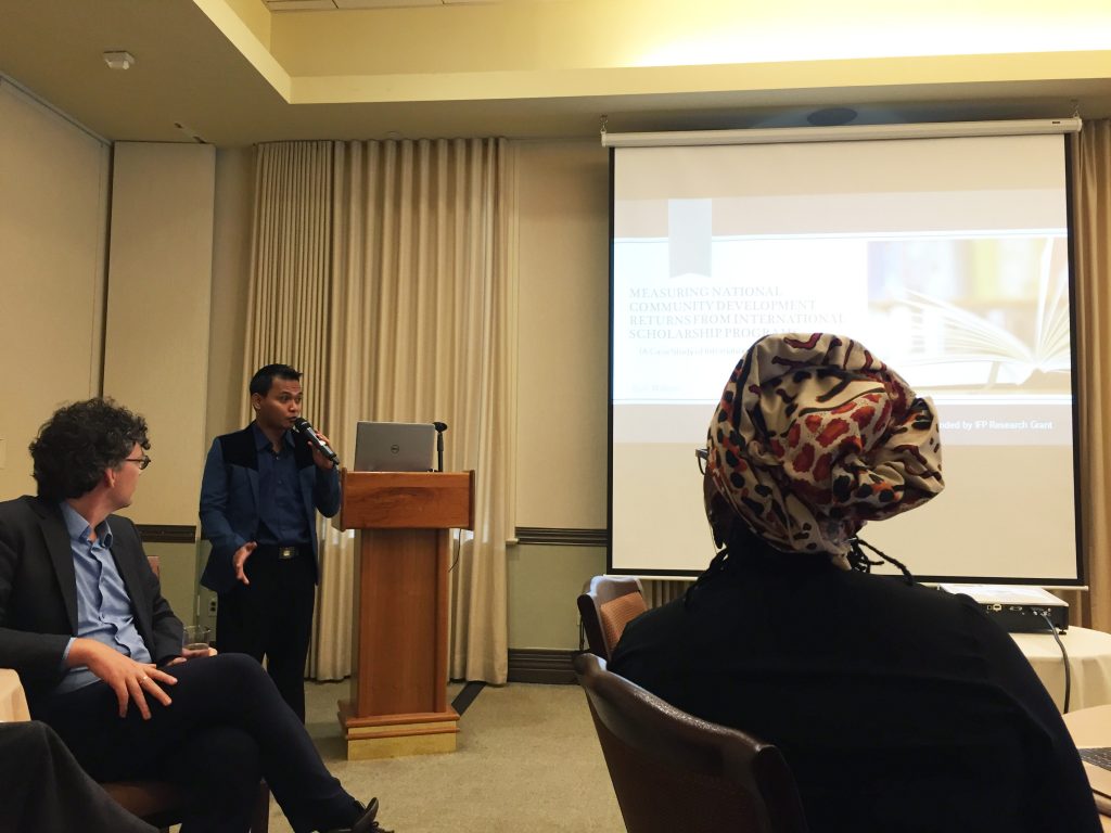 Budi Waluyo presents his work at the Columbia University symposium as Wim de Jong (left) and Oluwafunmilayo Para-Mallam (right) look on.