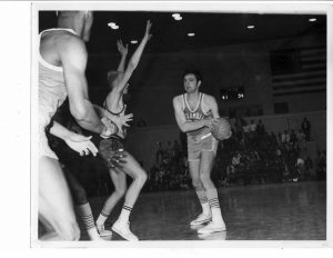 Dave Newmark, Columbia's 7-footer, trying to set up a play. 